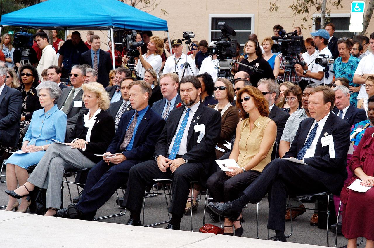 KENNEDY SPACE CENTER, FLA. -- Family members of the STS-107 astronauts and other dignitaries gather for the dedication ceremony of the Columbia Village at the Florida Institute of Technology in Melbourne, Fla.  Each of the seven new residence halls in the complex is named for one of the STS-107 astronauts who perished during the Columbia accident -- Rick Husband, Willie McCool, Laurel Clark, Michael Anderson, David Brown, Kalpana Chawla, and Ilan Ramon.
