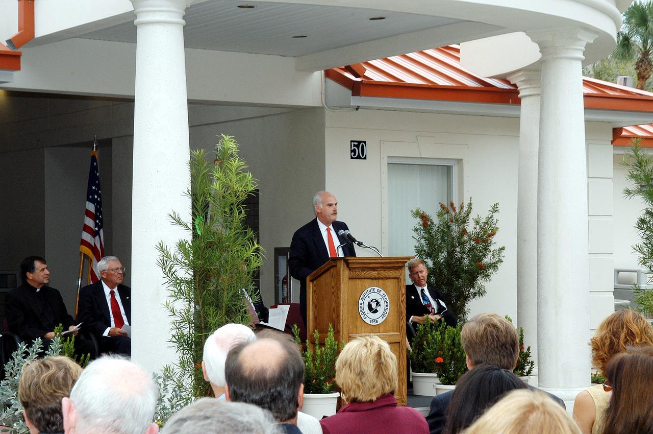 KENNEDY SPACE CENTER, FLA. -- NASA Associate Administrator for Space Flight William F. Readdy addresses the family members of the STS-107 astronauts, other dignitaries, members of the university community and the public gathered for the dedication ceremony of the Columbia Village at the Florida Institute of Technology in Melbourne, Fla.  Each of the seven new residence halls in the complex is named for one of the STS-107 astronauts who perished during the Columbia accident -- Rick Husband, Willie McCool, Laurel Clark, Michael Anderson, David Brown, Kalpana Chawla, and Ilan Ramon.