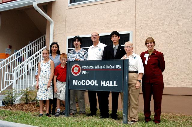NASA image: KENNEDY SPACE CENTER, FLA. -- Lani McCool (back row, left), wife of STS-107 Pilot Willie McCool, accompanied by their children and other family members, visits a new residence hall at the Florida Institute of Technology (FIT) in Melbourne, Fla., named for her late husband.  Family members of the STS-107 astronauts, other dignitaries, members of the university community and the public gathered for a dedication ceremony for the Columbia Village at FIT.  Each of the seven new residence halls in the complex is named for one of the STS-107 astronauts who perished during the Columbia accident -- Rick Husband, Willie McCool, Laurel Clark, Michael Anderson, David Brown, Kalpana Chawla, and Ilan Ramon.
