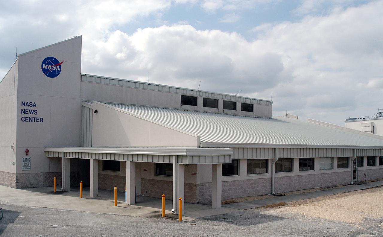 The NASA News Center, seen here, is the hub of news operations for the media, providing information and contacts about Space Shuttle processing and other activities around KSC. News Center staff also conduct media tours, escorting journalists and photo/videographers to key sites such as the launch pads and Vehicle Assembly Building as needed.