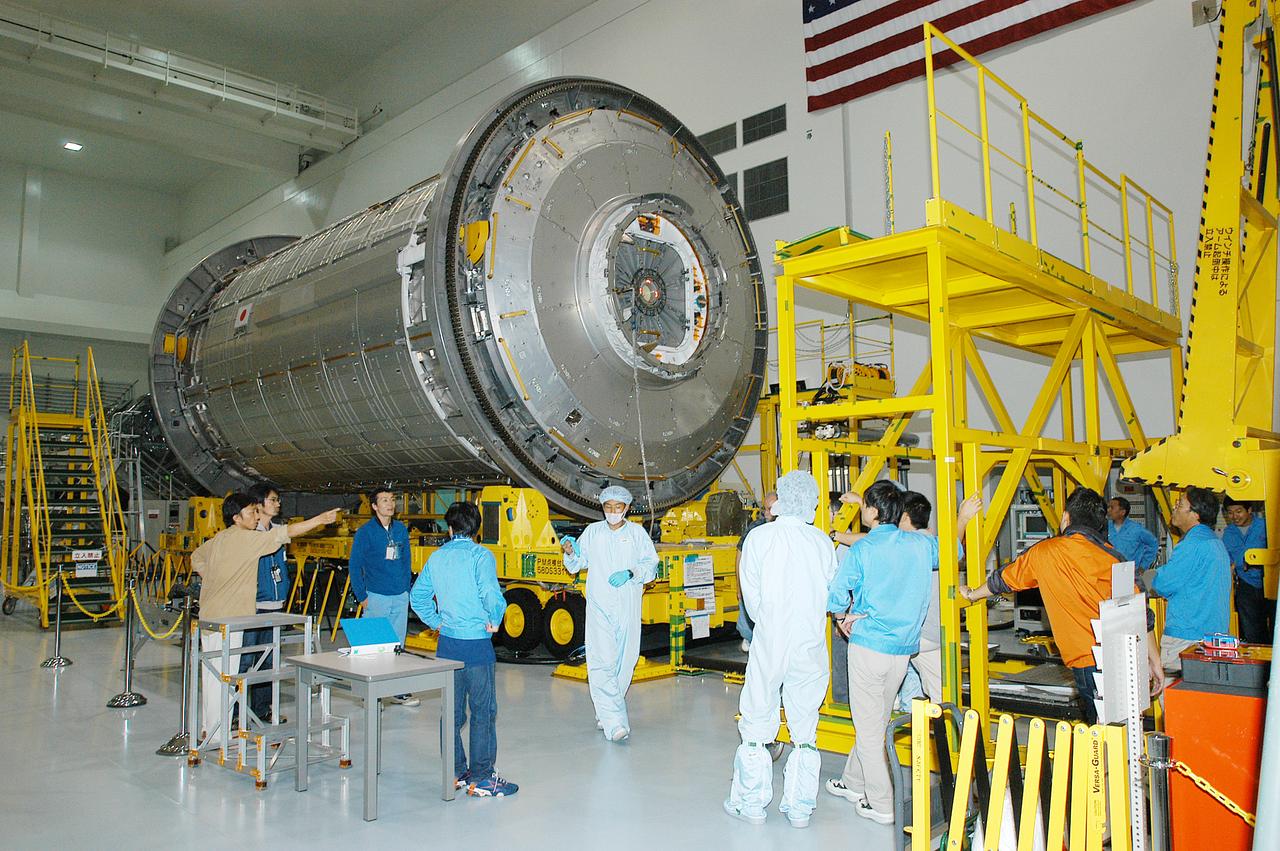 The Japanese Experiment Module (JEM) is moved on its workstand in the Space Station Processing Facility. The JEM will undergo pre-assembly measurements. Developed by the Japan Aerospace Exploration Agency (JAXA), the JEM will enhance the unique research capabilities of the orbiting complex by providing an additional environment for astronauts to conduct science experiments.                       