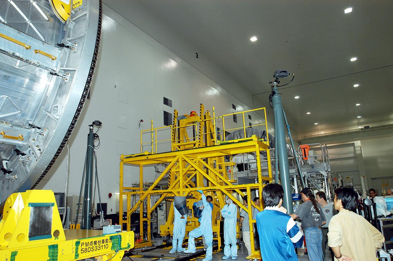 KENNEDY SPACE CENTER, FLA. -  The Japanese Experiment Module (JEM) is moved on its workstand in the Space Station Processing Facility.  The JEM will undergo pre-assembly measurements.  Developed by the Japan Aerospace Exploration Agency (JAXA), the JEM will enhance the unique research capabilities of the orbiting complex by providing an additional environment for astronauts to conduct science experiments.