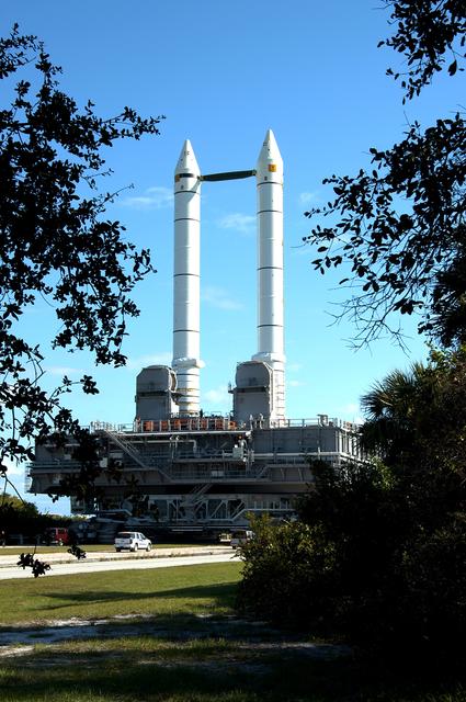 NASA image: KENNEDY SPACE CENTER, FLA. -   The crawler transporter slowly moves the Mobile Launcher Platform (MLP), carrying a set of twin solid rocket boosters, along the crawlerway in support of engineering analysis vibration tests on the crawler and MLP.  The crawler is moving at various speeds up to 1 mph in an effort to achieve vibration data gathering goals as it leaves the VAB and then returns.  The boosters are braced at the top for stability.  The primary purpose of these rollout tests is to gather data to develop future maintenance requirements on the transport equipment and the flight hardware. Various parts of the MLP and crawler transporter have been instrumented with vibration data collection equipment.