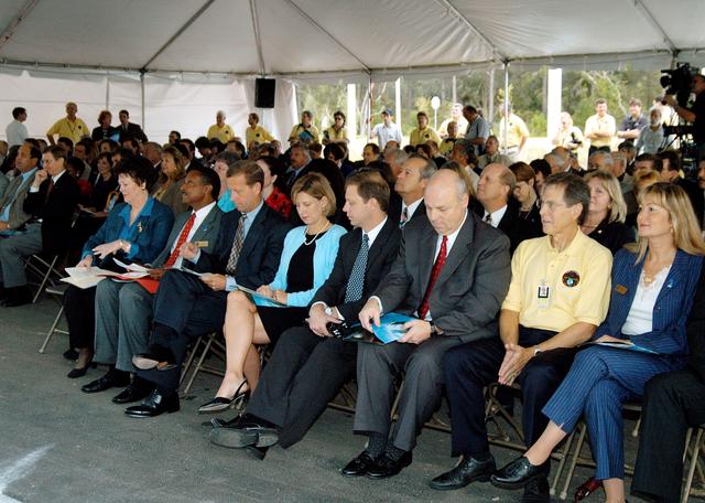 NASA image: KENNEDY SPACE CENTER, FLA. -  Dignitaries, invited guests, space center employees, and the media gather for a dedication and ribbon-cutting ceremony for the Space Life Sciences Lab hosted by NASA-Kennedy Space Center and the state of Florida at the new lab. Completed in August, the facility encompasses more than 100,000 square feet and was formerly known as the Space Experiment Research and Processing Laboratory or SERPL. The state, through the Florida Space Authority, built the research lab which is host to NASA, NASA’s Life Sciences Services contractor Dynamac Corp., Bionetics Corp., and researchers from the University of Florida.  Dynamac Corp. leases the facility.  The Florida Space Research Institute is responsible for gaining additional tenants from outside the NASA community.