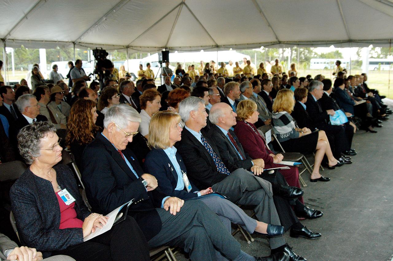KENNEDY SPACE CENTER, FLA. -  Dignitaries, invited guests, space center employees, and the media gather for a dedication and ribbon-cutting ceremony for the Space Life Sciences Lab hosted by NASA-Kennedy Space Center and the state of Florida at the new lab. Completed in August, the facility encompasses more than 100,000 square feet and was formerly known as the Space Experiment Research and Processing Laboratory or SERPL. The state, through the Florida Space Authority, built the research lab which is host to NASA, NASA’s Life Sciences Services contractor Dynamac Corp., Bionetics Corp., and researchers from the University of Florida.  Dynamac Corp. leases the facility.  The Florida Space Research Institute is responsible for gaining additional tenants from outside the NASA community.