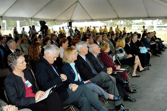 NASA image: KENNEDY SPACE CENTER, FLA. -  Dignitaries, invited guests, space center employees, and the media gather for a dedication and ribbon-cutting ceremony for the Space Life Sciences Lab hosted by NASA-Kennedy Space Center and the state of Florida at the new lab. Completed in August, the facility encompasses more than 100,000 square feet and was formerly known as the Space Experiment Research and Processing Laboratory or SERPL. The state, through the Florida Space Authority, built the research lab which is host to NASA, NASA’s Life Sciences Services contractor Dynamac Corp., Bionetics Corp., and researchers from the University of Florida.  Dynamac Corp. leases the facility.  The Florida Space Research Institute is responsible for gaining additional tenants from outside the NASA community.