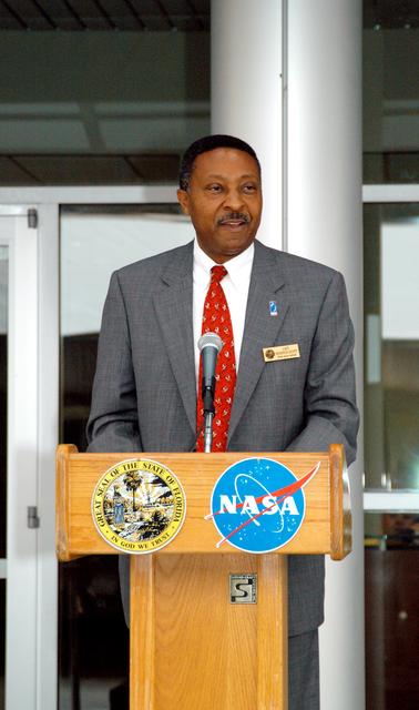 NASA image: KENNEDY SPACE CENTER, FLA. -  Capt. Winston Scott, executive director of the Florida Space Authority, speaks at a dedication and ribbon-cutting ceremony for the Space Life Sciences Lab hosted by NASA-Kennedy Space Center and the state of Florida at the new lab. Completed in August, the facility encompasses more than 100,000 square feet and was formerly known as the Space Experiment Research and Processing Laboratory or SERPL. The state, through the Florida Space Authority, built the research lab which is host to NASA, NASA’s Life Sciences Services contractor Dynamac Corp., Bionetics Corp., and researchers from the University of Florida.  Dynamac Corp. leases the facility.  The Florida Space Research Institute is responsible for gaining additional tenants from outside the NASA community.