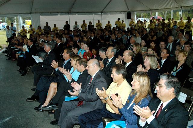 NASA image: KENNEDY SPACE CENTER, FLA. -  Dignitaries, invited guests, space center employees, and the media show their appreciation for the speakers at a dedication and ribbon-cutting ceremony for the Space Life Sciences Lab hosted by NASA-Kennedy Space Center and the state of Florida at the new lab. Completed in August, the facility encompasses more than 100,000 square feet and was formerly known as the Space Experiment Research and Processing Laboratory or SERPL. The state, through the Florida Space Authority, built the research lab which is host to NASA, NASA’s Life Sciences Services contractor Dynamac Corp., Bionetics Corp., and researchers from the University of Florida.  Dynamac Corp. leases the facility.  The Florida Space Research Institute is responsible for gaining additional tenants from outside the NASA community.