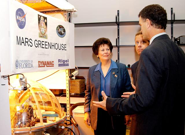NASA image: KENNEDY SPACE CENTER, FLA. -  The Honorable Toni Jennings (left), lieutenant governor of the state of Florida, and Frank T. Brogan, president of Florida Atlantic University, receive a briefing on the research that will be conducted in the Space Life Sciences Lab from Dr. Robert J. Ferl (right), director of Space Agriculture Biotechnology Research and Education (SABRE), University of Florida.  Jennings and Brogan are speaking at a dedication and ribbon-cutting ceremony for the lab hosted by NASA-Kennedy Space Center and the state of Florida at the new lab. Completed in August, the facility encompasses more than 100,000 square feet and was formerly known as the Space Experiment Research and Processing Laboratory or SERPL. The state, through the Florida Space Authority, built the research lab which is host to NASA, NASA’s Life Sciences Services contractor Dynamac Corp., Bionetics Corp., and researchers from the University of Florida.  Dynamac Corp. leases the facility.  The Florida Space Research Institute is responsible for gaining additional tenants from outside the NASA community.