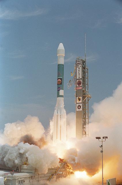 NASA image: KENNEDY SPACE CENTER, FLA. -   With smoke and steam billowing beneath, the Delta II rocket with its Mars Exploration Rover (MER-A) payload leaps off the launch pad into the blue sky to begin its journey to Mars.  Liftoff occurred on time at 1:58 p.m. EDT from Launch Complex 17-A, Cape Canaveral Air Force Station.  MER-A, known as "Spirit," is the first of two rovers being launched to Mars. When the two rovers arrive at the red planet in 2004, they will bounce to airbag-cushioned landings at sites offering a balance of favorable conditions for safe landings and interesting science. The rovers see sharper images, can explore farther and examine rocks better than anything that has ever landed on Mars. The designated site for the MER-A mission is Gusev Crater, which appears to have been a crater lake. The second rover, MER-B, is scheduled to launch June 25.