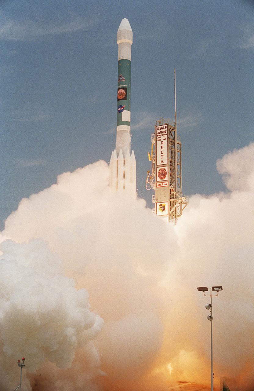 KENNEDY SPACE CENTER, FLA. -    With smoke and steam billowing beneath, the Delta II rocket with its Mars Exploration Rover (MER-A) payload leaps off the launch pad into the blue sky to begin its journey to Mars.  Liftoff occurred on time at 1:58 p.m. EDT from Launch Complex 17-A, Cape Canaveral Air Force Station.  MER-A, known as "Spirit," is the first of two rovers being launched to Mars. When the two rovers arrive at the red planet in 2004, they will bounce to airbag-cushioned landings at sites offering a balance of favorable conditions for safe landings and interesting science. The rovers see sharper images, can explore farther and examine rocks better than anything that has ever landed on Mars. The designated site for the MER-A mission is Gusev Crater, which appears to have been a crater lake. The second rover, MER-B, is scheduled to launch June 25.
