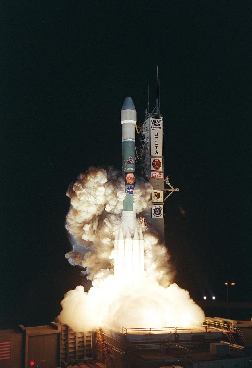 KENNEDY SPACE CENTER, FLA. - From a burst of fire and smoke, the Delta II launch vehicle races into the sky carrying the second Mars Exploration Rover, Opportunity.  The bright glare briefly illuminated Florida Space Coast beaches.  Opportunity’s dash to Mars began with liftoff at 11:18:15 p.m. Eastern Daylight Time from Cape Canaveral Air Force Station, Fla.   The spacecraft separated successfully from the Delta's third stage 83 minutes later, after it had been boosted out of Earth orbit and onto a course toward Mars.