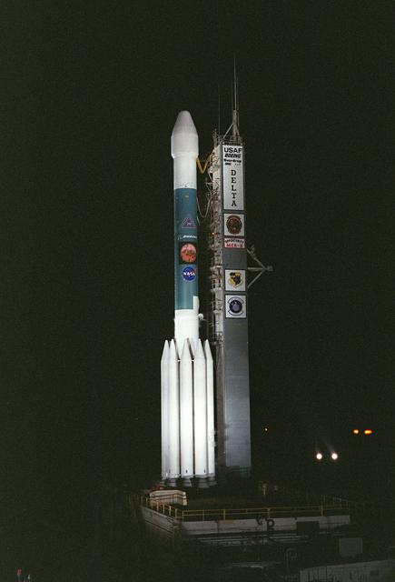 KENNEDY SPACE CENTER, FLA. - On Launch Complex 17-B, Cape Canaveral Air Force Station, the Delta II Heavy launch vehicle carrying the second Mars Exploration Rover, Opportunity, is poised for launch after rollback of the Mobile Service Tower.  Opportunity will reach Mars on Jan. 25, 2004. Together the two MER rovers, Spirit (launched June 10) and Opportunity, seek to determine the history of climate and water at two sites on Mars where conditions may once have been favorable to life. The rovers are identical. They will navigate themselves around obstacles as they drive across the Martian surface, traveling up to about 130 feet each Martian day.  Each rover carries five scientific instruments including a panoramic camera and microscope, plus a rock abrasion tool that will grind away the outer surfaces of rocks to expose their interiors for examination. Each rover’s prime mission is planned to last three months on Mars.
