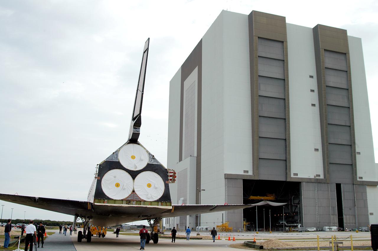 KENNEDY SPACE CENTER, FLA. -- Endeavour is towed toward the Vehicle Assembly Building for temporary storage.  The orbiter has been moved from the Orbiter Processing Facility (OPF) to allow work to be performed in the OPF that can only be accomplished while the bay is empty. Work scheduled in the OPF includes annual validation of the bay’s cranes, work platforms, lifting mechanisms and jack stands. Endeavour will remain in the VAB for approximately 12 days, then return to the OPF.