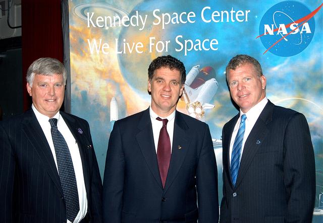 NASA image: KENNEDY SPACE CENTER, FLA. --After a Town Hall meeting at KSC, Center Director Jim Kennedy and U.S. Reps. Dave Weldon and Tom Feeney pause for a photo before heading to the NASA-KSC News Center for a press conference.  Weldon and Feeney discussed the new mission for NASA outlined by President George W. Bush Jan. 14.  The congressmen and Kennedy also answered questions from employees in the audience.