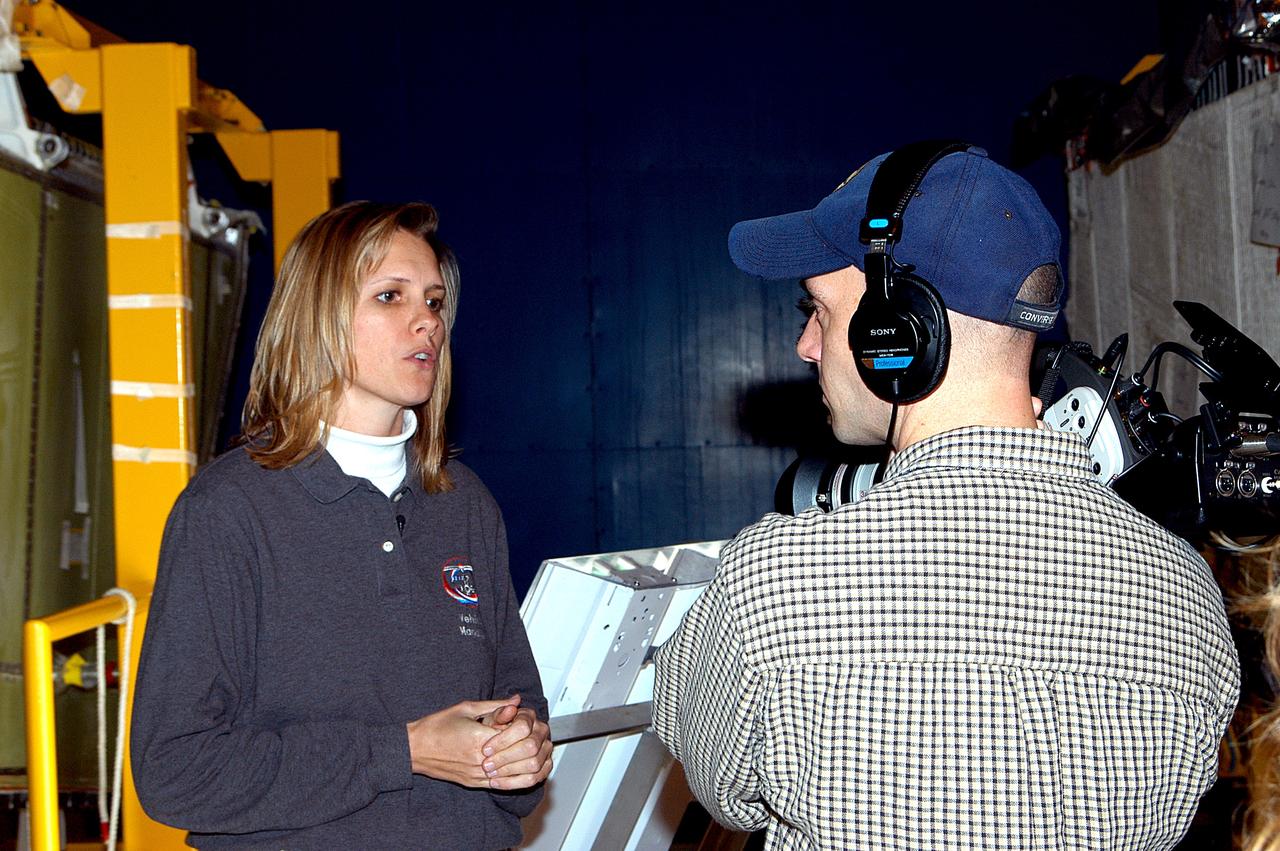 KENNEDY SPACE CENTER, FLA. -  Stephanie Stilson, NASA vehicle manager for Discovery, is being filmed for a special feature on the KSC Web about the recent Orbiter Major Modification period, which included inspection, modifications and reservicing of most systems onboard Discovery, plus installation of a Multifunction Electronic Display Subsystem (MEDS) - a state-of-the-art “glass cockpit.”  The orbiter is now being prepared for eventual launch on a future mission.
