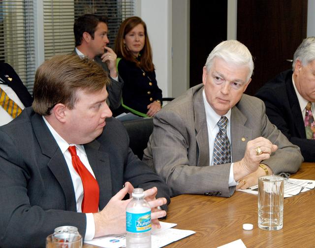 NASA image: KENNEDY SPACE CENTER, FLA. - - U.S. Representative Ric Keller (left) listens intently to a presentation proposing the use of the Central Florida Research Park, near Orlando, as the site of NASA’s new Shared Services Center.  NASA and Florida officials toured the research park as well.  Central Florida leaders are proposing the research park as the site for the center, which would centralize NASA’s payroll, accounting, human resources, facilities and procurement offices that are now handled at each field center.  The consolidation is part of the One NASA focus.  Six sites around the U.S. are under consideration by NASA.