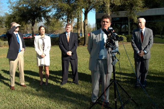 NASA image: KENNEDY SPACE CENTER, FLA. - Congressman Dave Weldon talks to the media at the Central Florida Research Park, near Orlando.  He, NASA Administrator Sean O’Keefe and other government officials were at the park for a presentation about the assets of the research park as the site of NASA’s new Shared Services Center. Behind Weldon are (left to right) U.S. Senator Bill Nelson; Pamella J. Dana, Ph.D., director, Office of Tourism, Trade, and Economic Development in Florida; and Florida Congressman Tom Feeney; at right is O’Keefe.  Six sites around the U.S. are under consideration for location of the Center, which would centralize NASA’s payroll, accounting, human resources, facilities and procurement offices that are now handled at each field center.  The consolidation is part of the One NASA focus.  Center Director Jim Kennedy also attended the presentation.