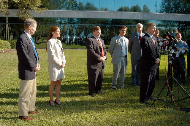 NASA image: KENNEDY SPACE CENTER, FLA. - Florida Congressman Tom Feeney talks to the media at the Central Florida Research Park, near Orlando.  He, NASA Administrator Sean O’Keefe and government officials were at the park for a presentation about the assets of the research park as the site of NASA’s new Shared Services Center. Behind Feeney are (left to right) U.S. Senator Bill Nelson; Pamella J. Dana, Ph.D., director, Office of Tourism, Trade, and Economic Development in Florida; U.S. Representative Ric Keller; Congressman Dave Weldon; and O’Keefe.  Six sites around the U.S. are under consideration for location of the Center, which would centralize NASA’s payroll, accounting, human resources, facilities and procurement offices that are now handled at each field center.  The consolidation is part of the One NASA focus.  Center Director Jim Kennedy also attended the presentation.