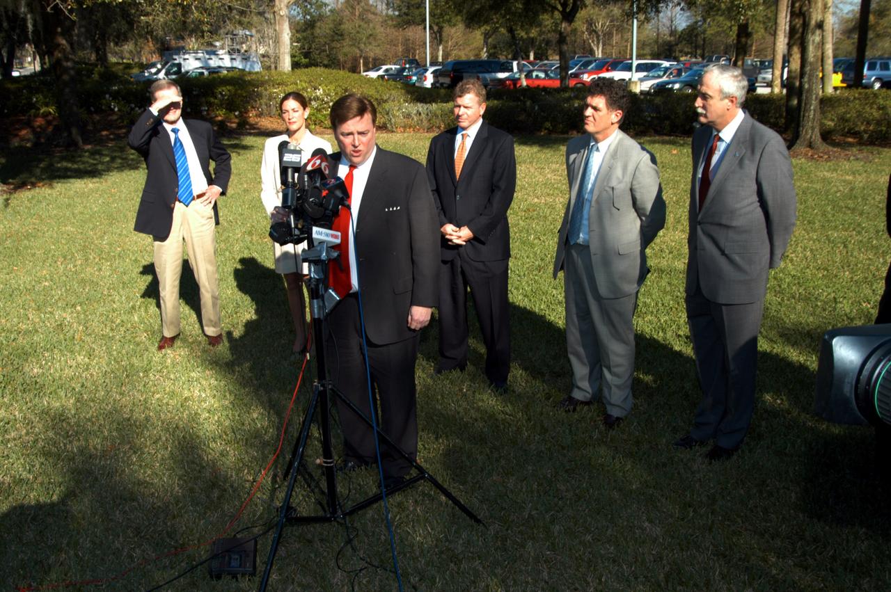 KENNEDY SPACE CENTER, FLA. - - U.S. Representative Ric Keller talks to the media at the Central Florida Research Park, near Orlando. He, NASA Administrator Sean O’Keefe and government officials were at the park for a presentation about the assets of the research park as the site of NASA’s new Shared Services Center. Behind Keller are (left to right) U.S. Senator Bill Nelson; Pamella J. Dana, Ph.D., director, Office of Tourism, Trade, and Economic Development in Florida; Florida Congressman Tom Feeney; Congressman Dave Weldon; and O’Keefe. Six sites around the U.S. are under consideration for location of the Center, which would centralize NASA’s payroll, accounting, human resources, facilities and procurement offices that are now handled at each field center. The consolidation is part of the One NASA focus. Center Director Jim Kennedy also attended the presentation.