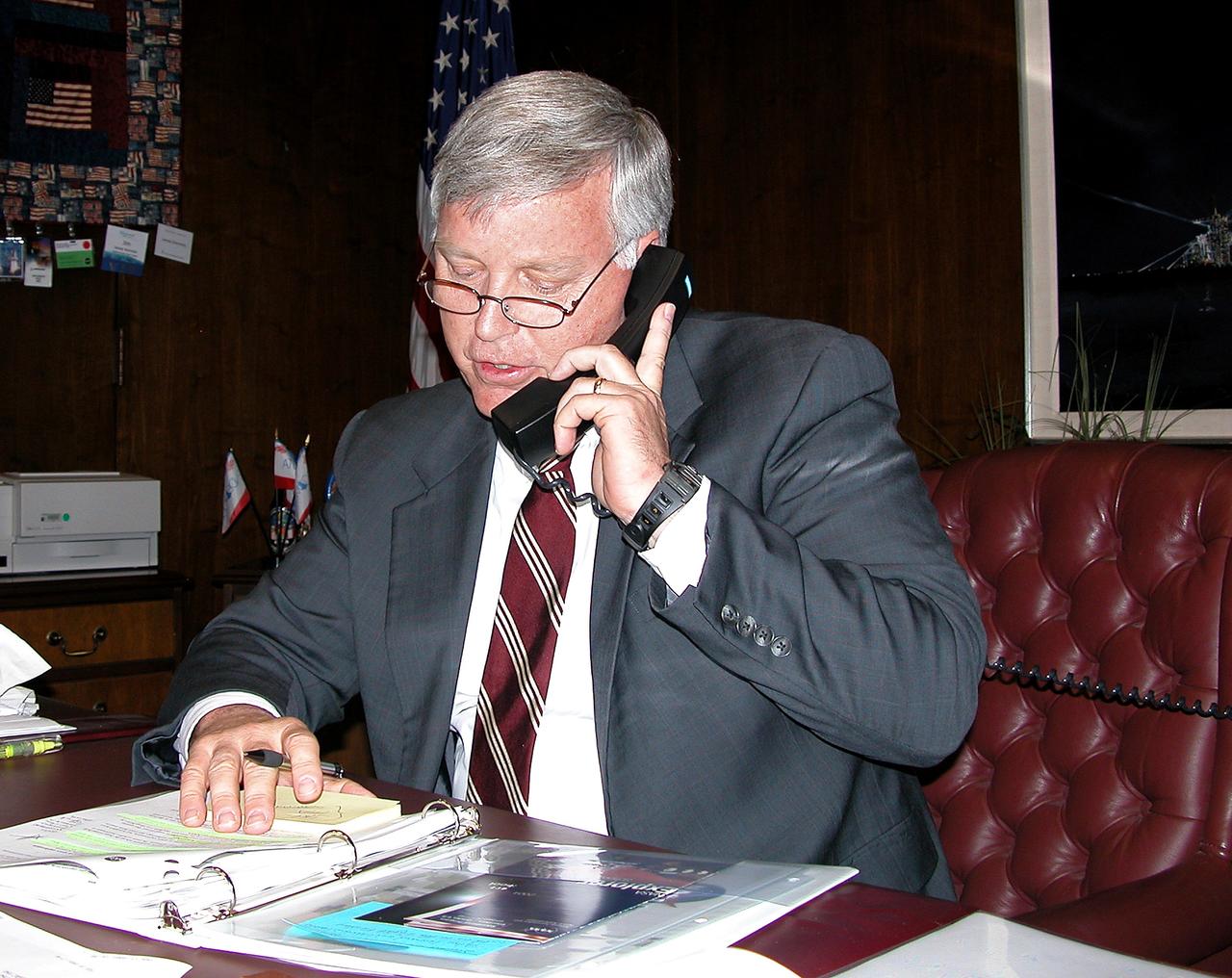 KENNEDY SPACE CENTER, FLA. - Center Director Jim Kennedy talks to radio station WFLA-AM and Florida Radio Network about his trip to Garland V. Stewart Magnet Middle School, a NASA Explorer School (NES) in Tampa, Fla. Kennedy made the trip with NASA astronaut Kay Hire to share the agency’s new vision for space exploration with the next generation of explorers. Kennedy is talking with students about our destiny as explorers, NASA’s stepping stone approach to exploring Earth, the Moon, Mars and beyond, how space impacts our lives, and how people and machines rely on each other in space.