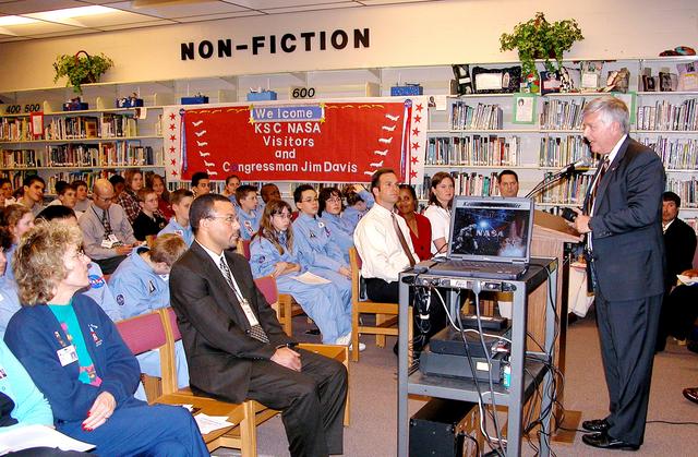 NASA image: KENNEDY SPACE CENTER, FLA. - Center Director Jim Kennedy talks to students in Garland V. Stewart Magnet Middle School, a NASA Explorer School (NES) in Tampa, Fla.  Kennedy  made the trip with NASA astronaut Kay Hire to share the agency’s new vision for space exploration with the next generation of explorers. Kennedy is talking with students about our destiny as explorers, NASA’s stepping stone approach to exploring Earth, the Moon, Mars and beyond, how space impacts our lives, and how people and machines rely on each other in space.