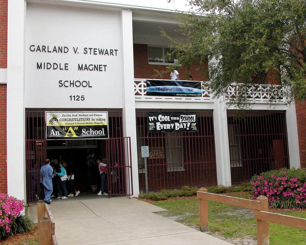 KENNEDY SPACE CENTER, FLA. - Garland V. Stewart Magnet Middle School, a NASA Explorer School (NES) in Tampa, Fla., is the site where Center Director Jim Kennedy and astronaut Kay Hire shared the agency’s new vision for space exploration with the next generation of explorers. Kennedy talked with students about our destiny as explorers, NASA’s stepping stone approach to exploring Earth, the Moon, Mars and beyond, how space impacts our lives, and how people and machines rely on each other in space.