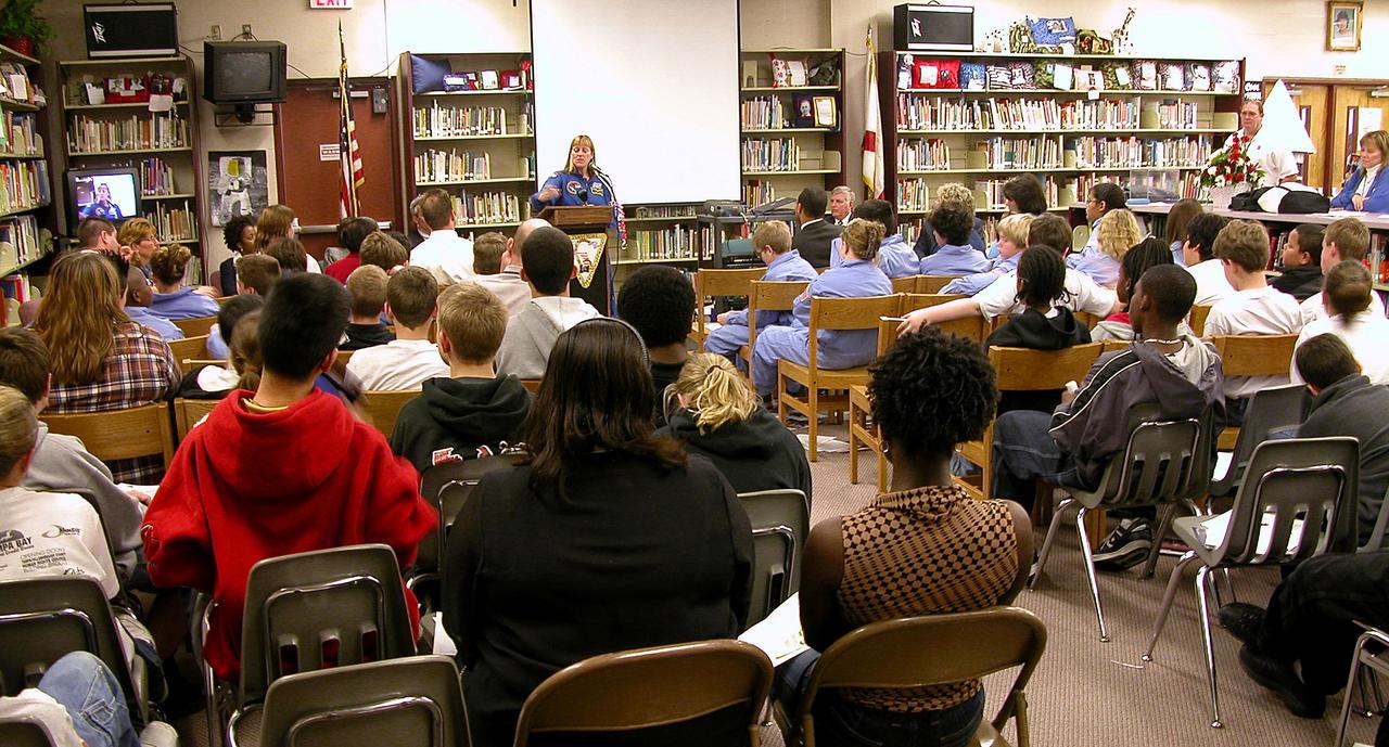 KENNEDY SPACE CENTER, FLA. - Students at Garland V. Stewart Magnet Middle School, a NASA Explorer School (NES) in Tampa, Fla., listen attentively to astronaut Kay Hire. She and Center Director Jim Kennedy were at the school to share the agency’s new vision for space exploration with the next generation of explorers. Kennedy is talking with students about our destiny as explorers, NASA’s stepping stone approach to exploring Earth, the Moon, Mars and beyond, how space impacts our lives, and how people and machines rely on each other in space.