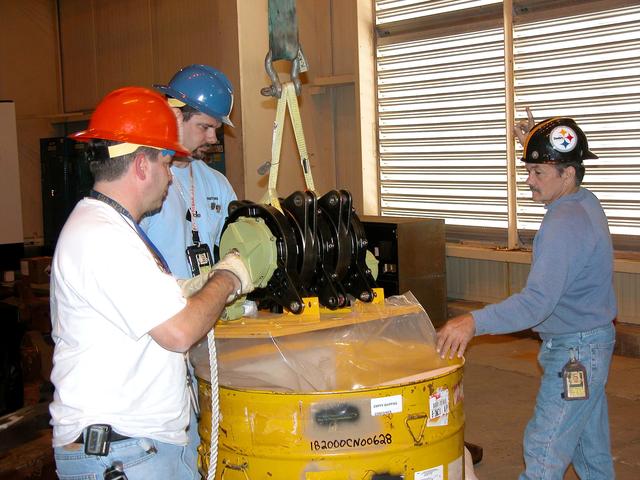 NASA image: KENNEDY SPACE CENTER, FLA. -  One of four rudder speed brake actuators arrives at Cape Canaveral Air Force Station.  The actuators, to be installed on the orbiter Discovery, are being X-rayed at the Radiographic High-Energy X-ray Facility to determine if the gears were installed correctly. Discovery has been assigned to the first Return to Flight mission, STS-114, a logistics flight to the International Space Station.