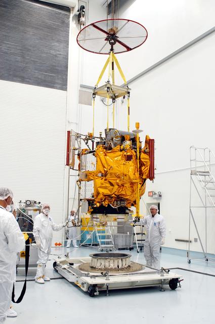 NASA image: KENNEDY SPACE CENTER, FLA. -  At the Astrotech Space Operations processing facilities, NASA’s MESSENGER spacecraft is lifted off the pallet for transfer to a work stand. There employees of the Johns Hopkins University Applied Physics Laboratory, builders of the spacecraft, will perform an initial state-of-health check.  Then processing for launch can begin, including checkout of the power systems, communications systems and control systems.  The thermal blankets will also be attached for flight.  MESSENGER - short for MErcury Surface, Space ENvironment, GEochemistry and Ranging - will be launched May 11 on a six-year mission aboard a Boeing Delta II rocket.  Liftoff is targeted for 2:26 a.m. EDT on Tuesday, May 11.
