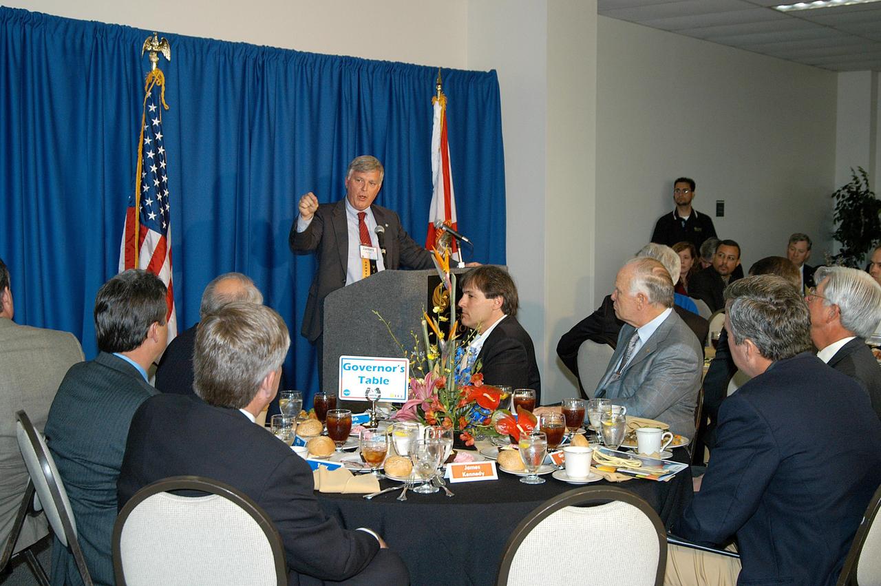 KENNEDY SPACE CENTER, FLA. -  During the luncheon held at the 2004 Florida Regional FIRST competition at the University of Central Florida, Center Director Jim Kennedy praises the teamwork of the students involved.  The event hosted 41 teams from Canada, Brazil, Great Britain and the United States.  Florida Gov. Jeb Bush also spoke at the luncheon.  FIRST is a nonprofit organization, For Inspiration and Recognition of Science and Technology, that sponsors the event pitting gladiator robots against each other in an athletic-style competition. The FIRST robotics competition is designed to provide students with a hands-on, inside look at engineering and other professional careers, pairing high school students with engineer mentors and corporations.