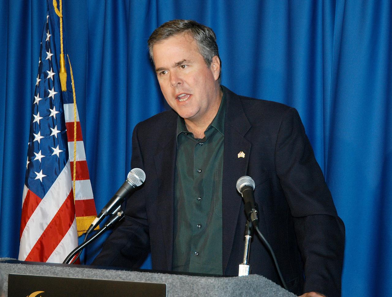 KENNEDY SPACE CENTER, FLA. -  Florida Gov. Jeb Bush speaks to attendees at the luncheon held at the 2004 Florida Regional FIRST competition at the University of Central Florida.  The event hosted 41 teams from Canada, Brazil, Great Britain and the United States.  Florida Gov. Jeb Bush also spoke at the luncheon.  FIRST is a nonprofit organization, For Inspiration and Recognition of Science and Technology, that sponsors the event pitting gladiator robots against each other in an athletic-style competition. The FIRST robotics competition is designed to provide students with a hands-on, inside look at engineering and other professional careers, pairing high school students with engineer mentors and corporations.