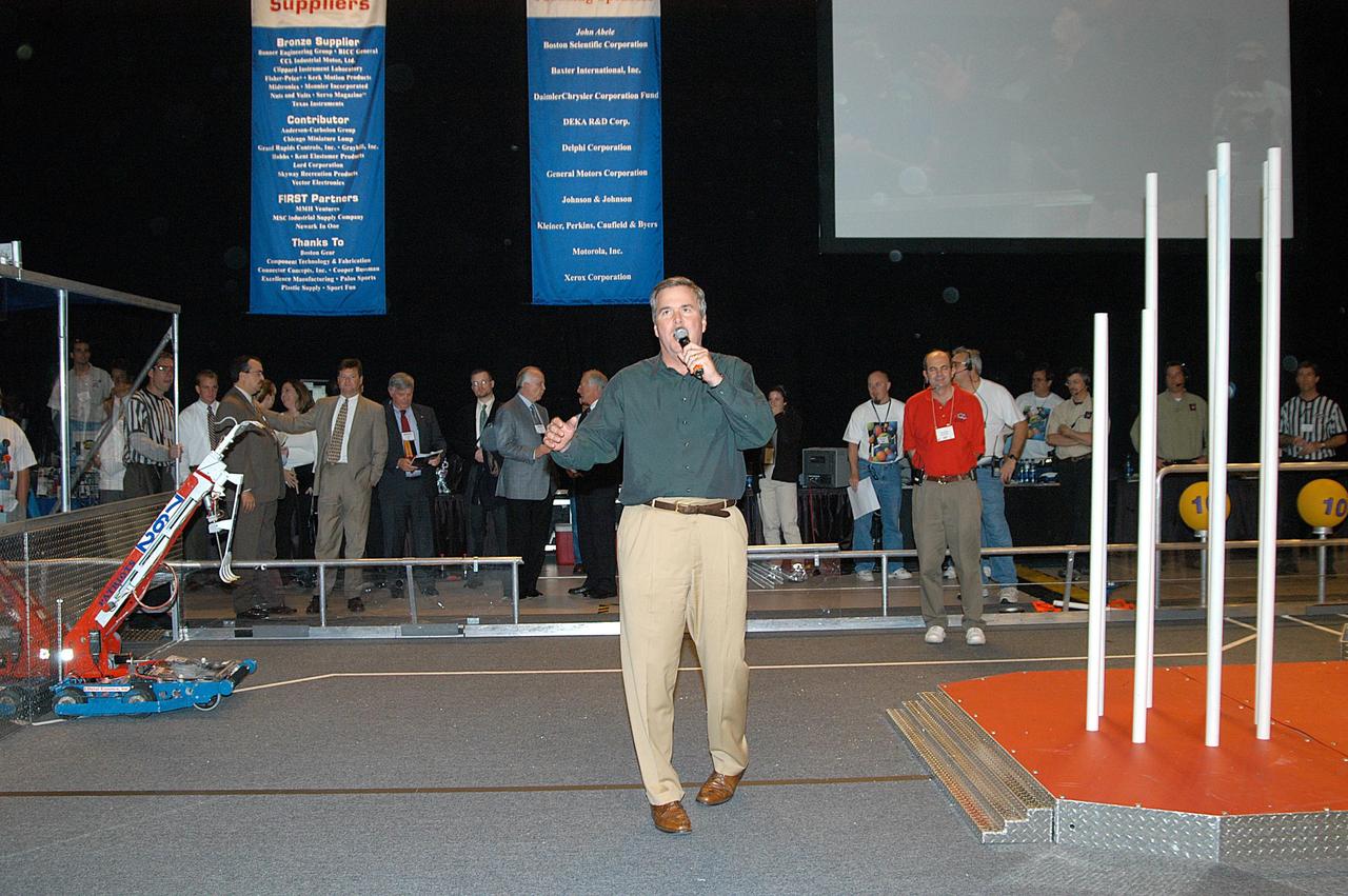 KENNEDY SPACE CENTER, FLA. -  Florida Gov. Jeb Bush speaks to attendees at the 2004 Florida Regional FIRST competition at the University of Central Florida.  The event hosted 41 teams from Canada, Brazil, Great Britain and the United States.  Bush and Center Director Jim Kennedy also spoke at the luncheon.  FIRST is a nonprofit organization, For Inspiration and Recognition of Science and Technology, that sponsors the event pitting robots against each other in an athletic-style competition. The FIRST robotics competition is designed to provide students with a hands-on, inside look at engineering and other professional careers, pairing high school students with engineer mentors and corporations.