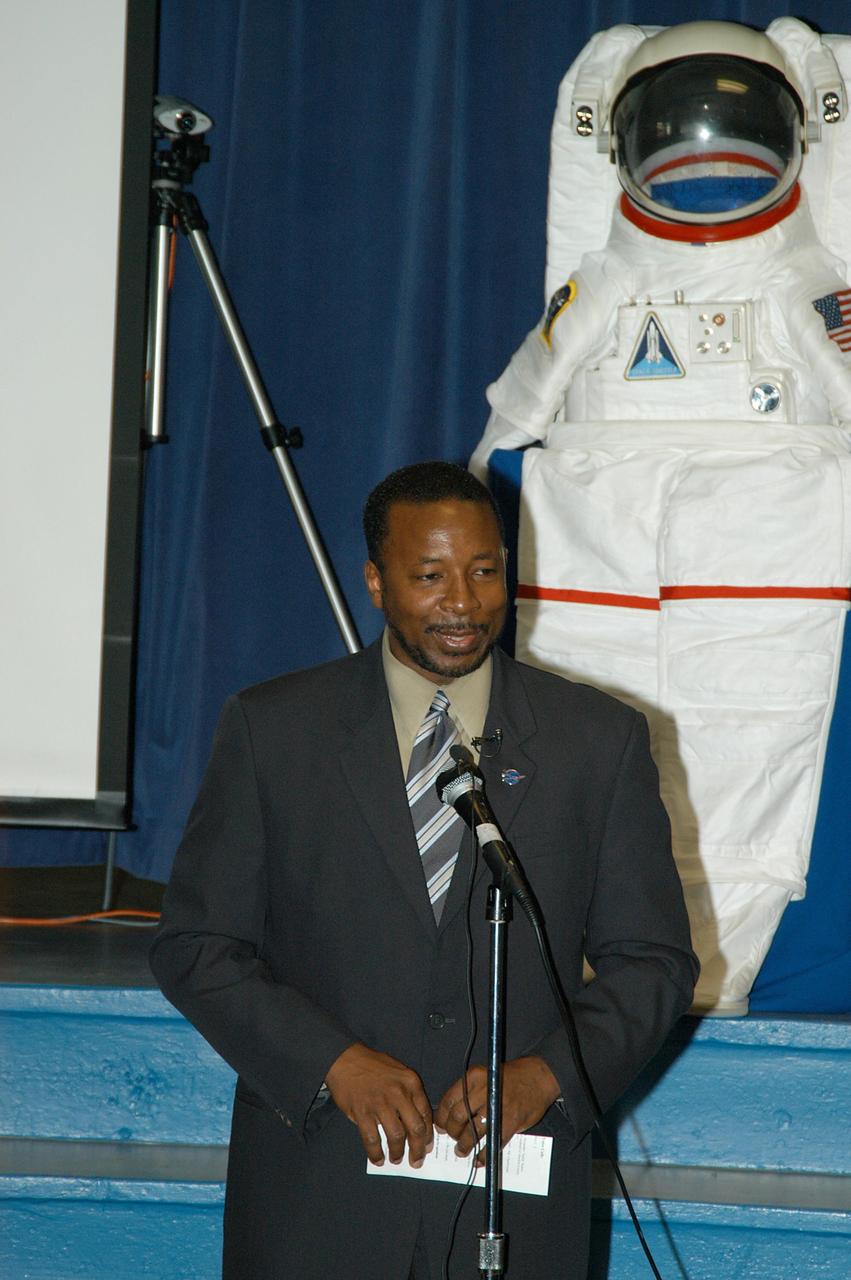 KENNEDY SPACE CENTER, FLA. - At Howard Bishop Middle School in Gainesville, Fla., Dr. Woodrow Whitlow Jr., KSC deputy director, shares the new vision for space exploration with the students, the next generation of explorers. Whitlow talked about our destiny as explorers, NASA’s stepping stone approach to exploring Earth, the Moon, Mars and beyond, how space impacts our lives, and how people and machines rely on each other in space. The presentation also included a downlink from the International Space Station for students to ask questions of the Expedition 8 crew, Commander Michael Foale and Flight Engineer Alexander Kaleri. Howard Bishop Middle School is one of 50 nationwide (four in Florida) in the NASA Explorer Schools (NES) Program. NES establishes a three-year partnership between NASA and 50 NASA Explorer Schools teams, consisting of teachers and education administrators from diverse communities nationwide.