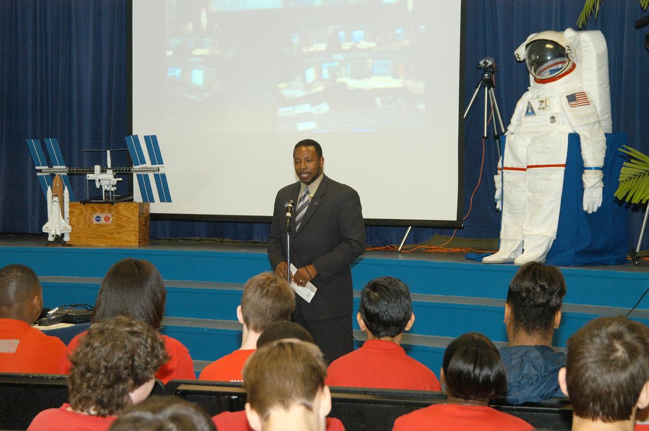 KENNEDY SPACE CENTER, FLA. - At Howard Bishop Middle School in Gainesville, Fla., KSC Deputy Director Dr. Woodrow Whitlow Jr. shares the new vision for space exploration with the students, the next generation of explorers. Whitlow talked about our destiny as explorers, NASA’s stepping stone approach to exploring Earth, the Moon, Mars and beyond, how space impacts our lives, and how people and machines rely on each other in space. The presentation also included a downlink from the International Space Station for students to ask questions of the Expedition 8 crew, Commander Michael Foale and Flight Engineer Alexander Kaleri. Howard Bishop Middle School is one of 50 nationwide (four in Florida) in the NASA Explorer Schools (NES) Program. NES establishes a three-year partnership between NASA and 50 NASA Explorer Schools teams, consisting of teachers and education administrators from diverse communities nationwide.