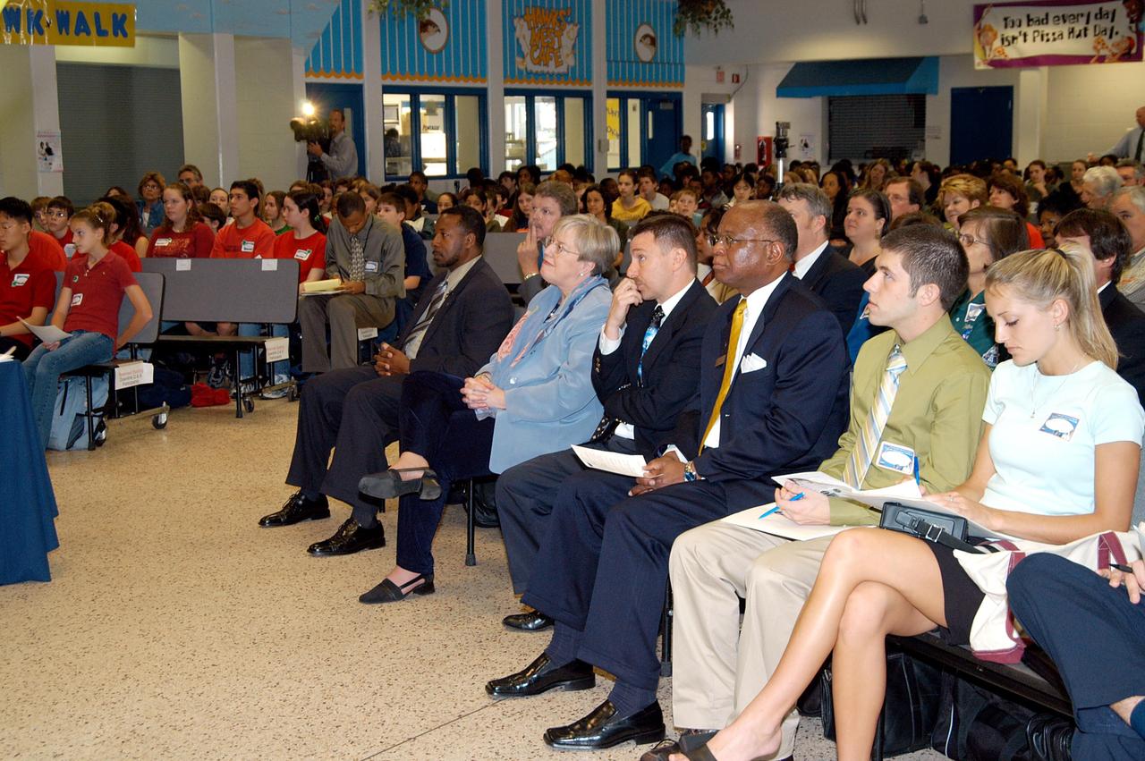 KENNEDY SPACE CENTER, FLA. - Students, teachers and administrators of Howard Bishop Middle School in Gainesville, Fla., listen to a presentation that shared the new vision for space exploration, KSC Deputy Director Dr. Woodrow Whitlow Jr. talked about our destiny as explorers, NASA’s stepping stone approach to exploring Earth, the Moon, Mars and beyond, how space impacts our lives, and how people and machines rely on each other in space. The presentation also included a downlink from the International Space Station for students to ask questions of the Expedition 8 crew, Commander Michael Foale and Flight Engineer Alexander Kaleri. Howard Bishop Middle School is one of 50 nationwide (four in Florida) in the NASA Explorer Schools (NES) Program. NES establishes a three-year partnership between NASA and 50 NASA Explorer Schools teams, consisting of teachers and education administrators from diverse communities nationwide.