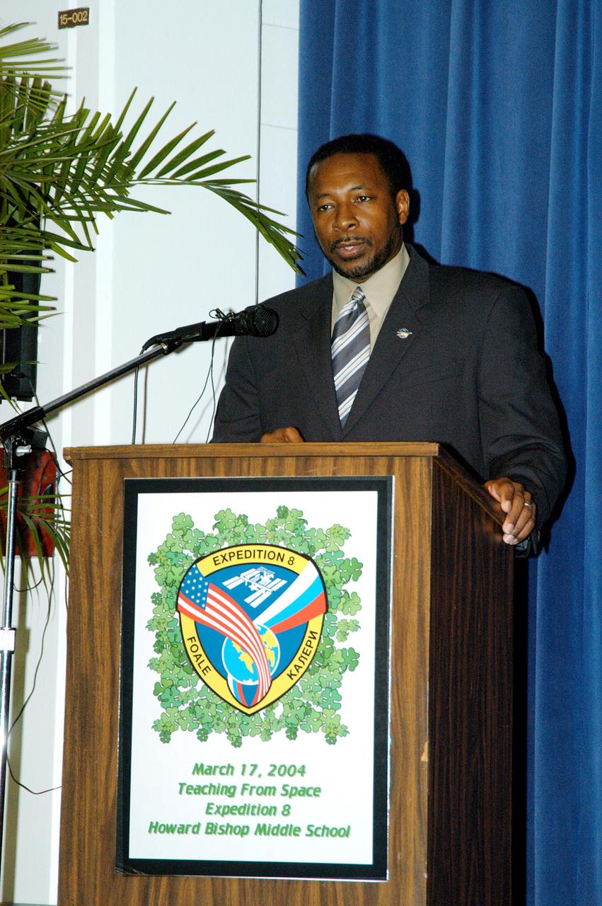 KENNEDY SPACE CENTER, FLA. - At Howard Bishop Middle School in Gainesville, Fla., Dr. Woodrow Whitlow Jr., KSC deputy director, shares the new vision for space exploration with the students, the next generation of explorers. Whitlow talked about our destiny as explorers, NASA’s stepping stone approach to exploring Earth, the Moon, Mars and beyond, how space impacts our lives, and how people and machines rely on each other in space. The presentation also included a downlink from the International Space Station for students to ask questions of the Expedition 8 crew, Commander Michael Foale and Flight Engineer Alexander Kaleri. Howard Bishop Middle School is one of 50 nationwide (four in Florida) in the NASA Explorer Schools (NES) Program. NES establishes a three-year partnership between NASA and 50 NASA Explorer Schools teams, consisting of teachers and education administrators from diverse communities nationwide.
