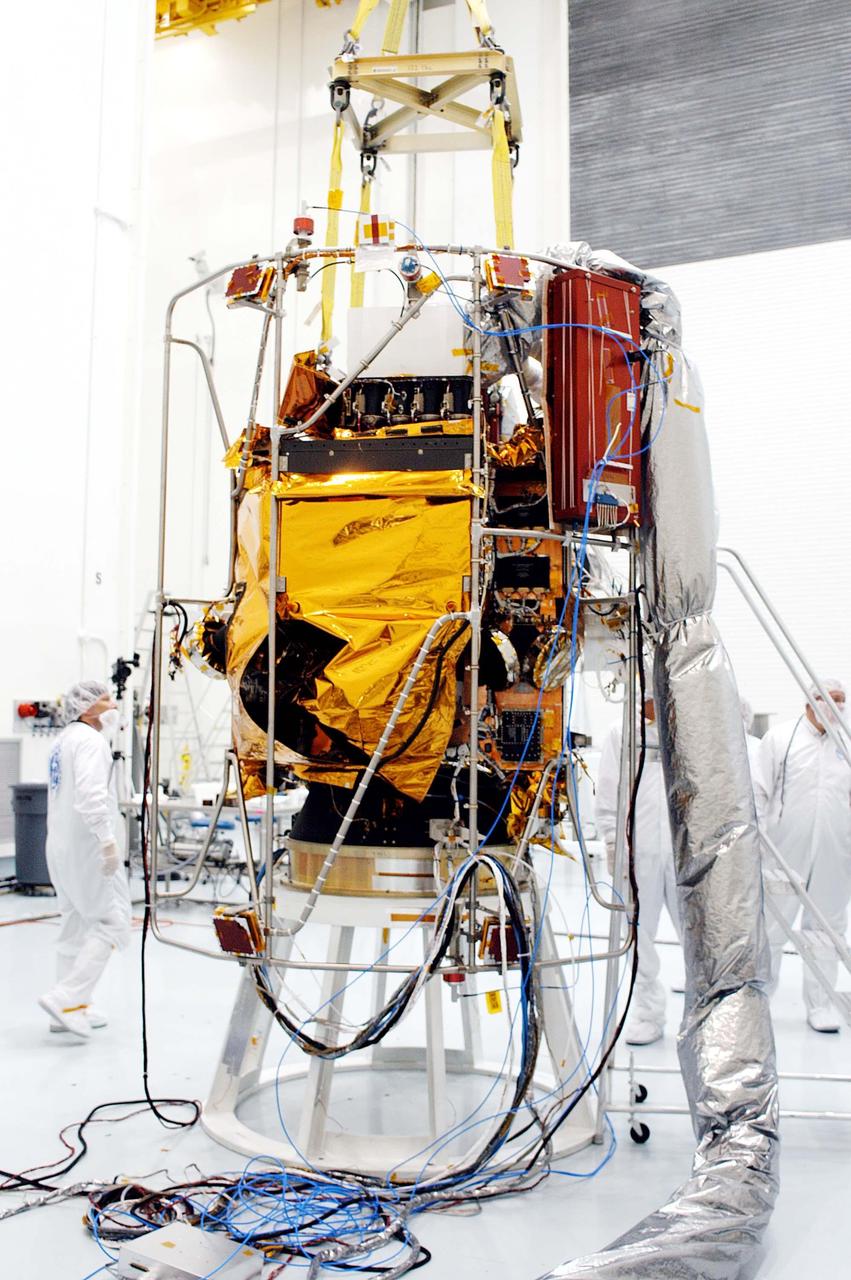 KENNEDY SPACE CENTER, FLA. -- At the Astrotech Space Operations processing facilities, the attachment of NASA’s MESSENGER spacecraft to a test stand is complete. The spacecraft is now ready for employees of the Johns Hopkins University Applied Physics Laboratory, builders of the spacecraft, to begin final processing for launch, including checkout of the power systems, communications systems and control systems. The thermal blankets will also be attached for flight. MESSENGER - short for MErcury Surface, Space ENvironment, GEochemistry and Ranging - will be launched aboard a Boeing Delta II rocket no earlier than July 30 on a six-year mission to study the planet Mercury.