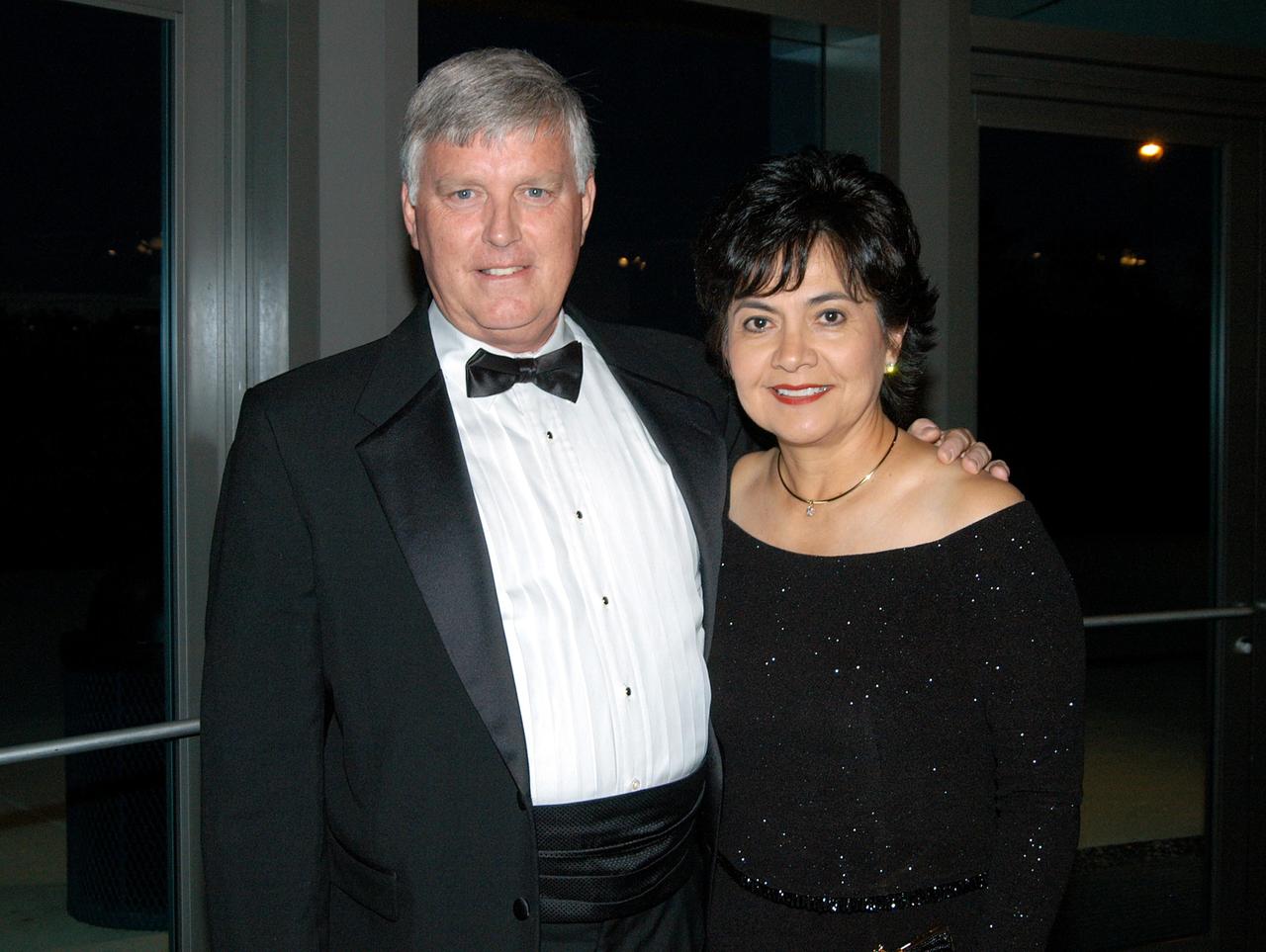 KENNEDY SPACE CENTER, FLA. -- Center Director Jim Kennedy and his wife pose during a break in the annual National Space Club Debus Award Banquet. The event was held at the Dr. Kurt H. Debus Conference Facility in the Visitor Complex. Receiving the Debus Award was KSC’s Director of the International Space Station/Payloads Processing directorate John J. “Tip” Talone. He was honored for his outstanding personal and professional efforts in supporting the U.S. space program, especially in his current role. The award was created by the National Space Club Florida Committee to recognize significant achievements and contributions made in Florida to American aerospace efforts. It is named for Dr. Kurt H. Debus, first director of KSC, from 1962 to 1974.