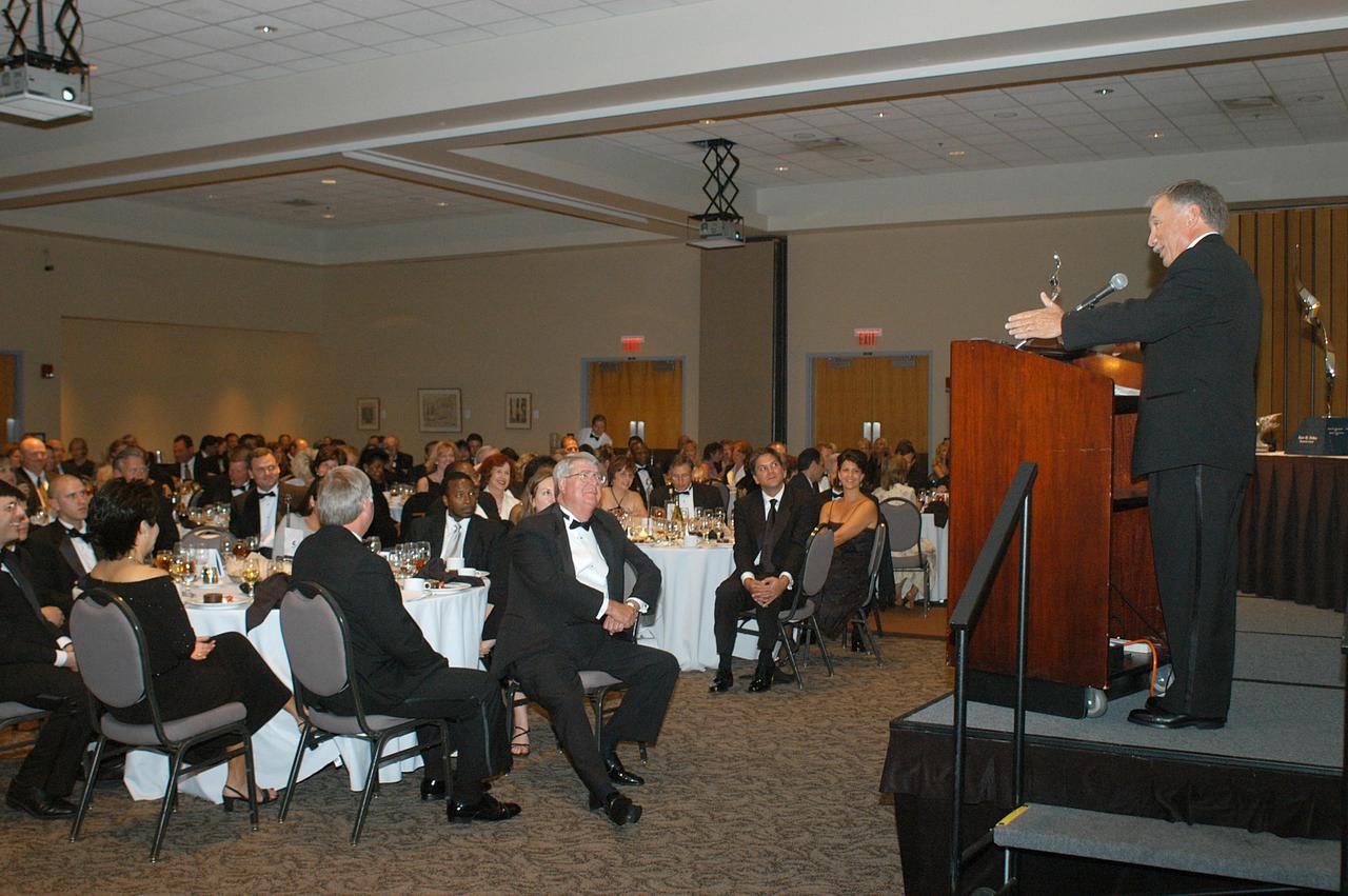 KENNEDY SPACE CENTER, FLA. -- Debus Award recipient John J. “Tip” Talone speaks to guests at the annual National Space Club Debus Award Banquet, held at the Dr. Kurt H. Debus Conference Facility in the KSC Visitor Complex. Director of the International Space Station/Payloads Processing directorate, Talone received the award in recognition of his outstanding personal and professional efforts in supporting the U.S. space program, especially in his current role. The award was created by the National Space Club Florida Committee to recognize significant achievements and contributions made in Florida to American aerospace efforts. It is named for Dr. Kurt H. Debus, first director of KSC, from 1962 to 1974.
