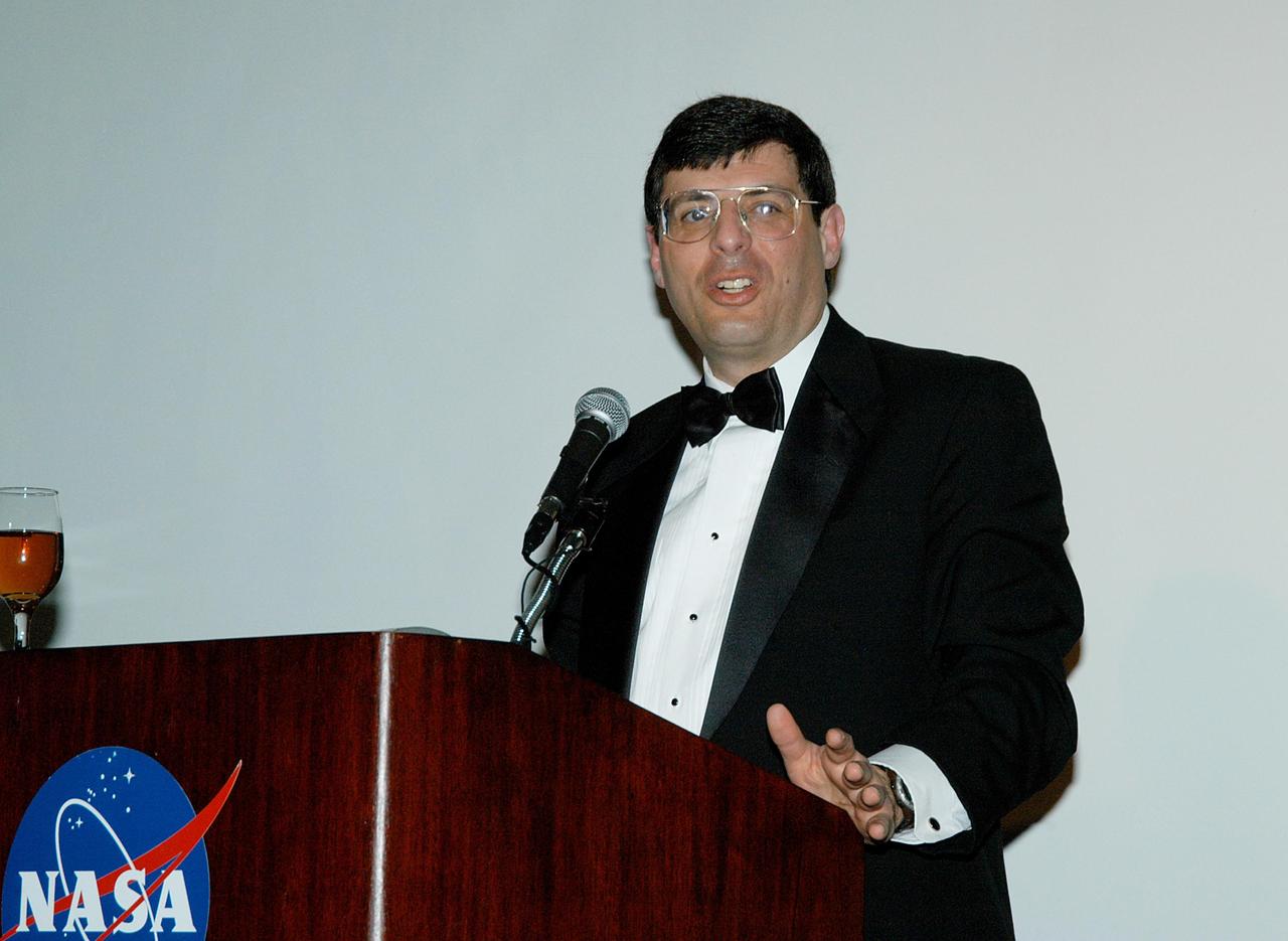 KENNEDY SPACE CENTER, FLA. -- Christopher Scolese speaks to the guests at the annual National Space Club Debus Award Banquet, held at the Dr. Kurt H. Debus Conference Facility in the KSC Visitor Complex. He is the deputy associate administrator in the Office of Space Science at NASA Headquarters. Receiving the Debus Award was KSC’s Director of the International Space Station/Payloads Processing directorate John J. “Tip” Talone. He was honored for his outstanding personal and professional efforts in supporting the U.S. space program, especially in his current role. The award was created by the National Space Club Florida Committee to recognize significant achievements and contributions made in Florida to American aerospace efforts. It is named for Dr. Kurt H. Debus, first director of KSC, from 1962 to 1974.