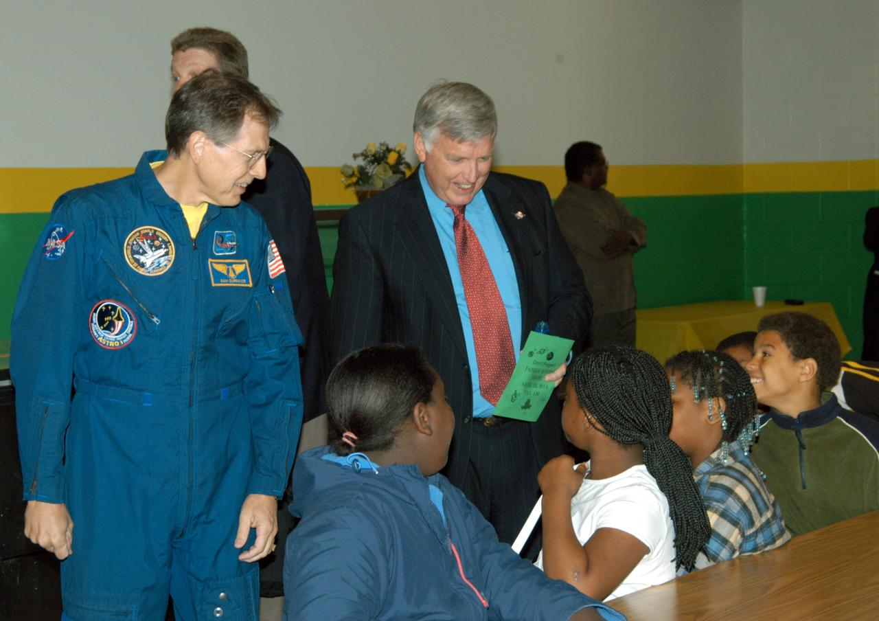 KENNEDY SPACE CENTER, FLA. -- Astronaut Sam Durrance and Center Director Jim Kennedy talk to students in a classroom at Oscar Patterson Elementary Magnet School in Panama City, Fla.  Kennedy is visiting NASA Explorer Schools in Florida and Georgia to share America’s new vision for space exploration with the next generation of explorers. Kennedy is talking with students about our destiny as explorers, NASA’s stepping stone approach to exploring Earth, the Moon, Mars and beyond, how space impacts our lives, and how people and machines rely on each other in space.