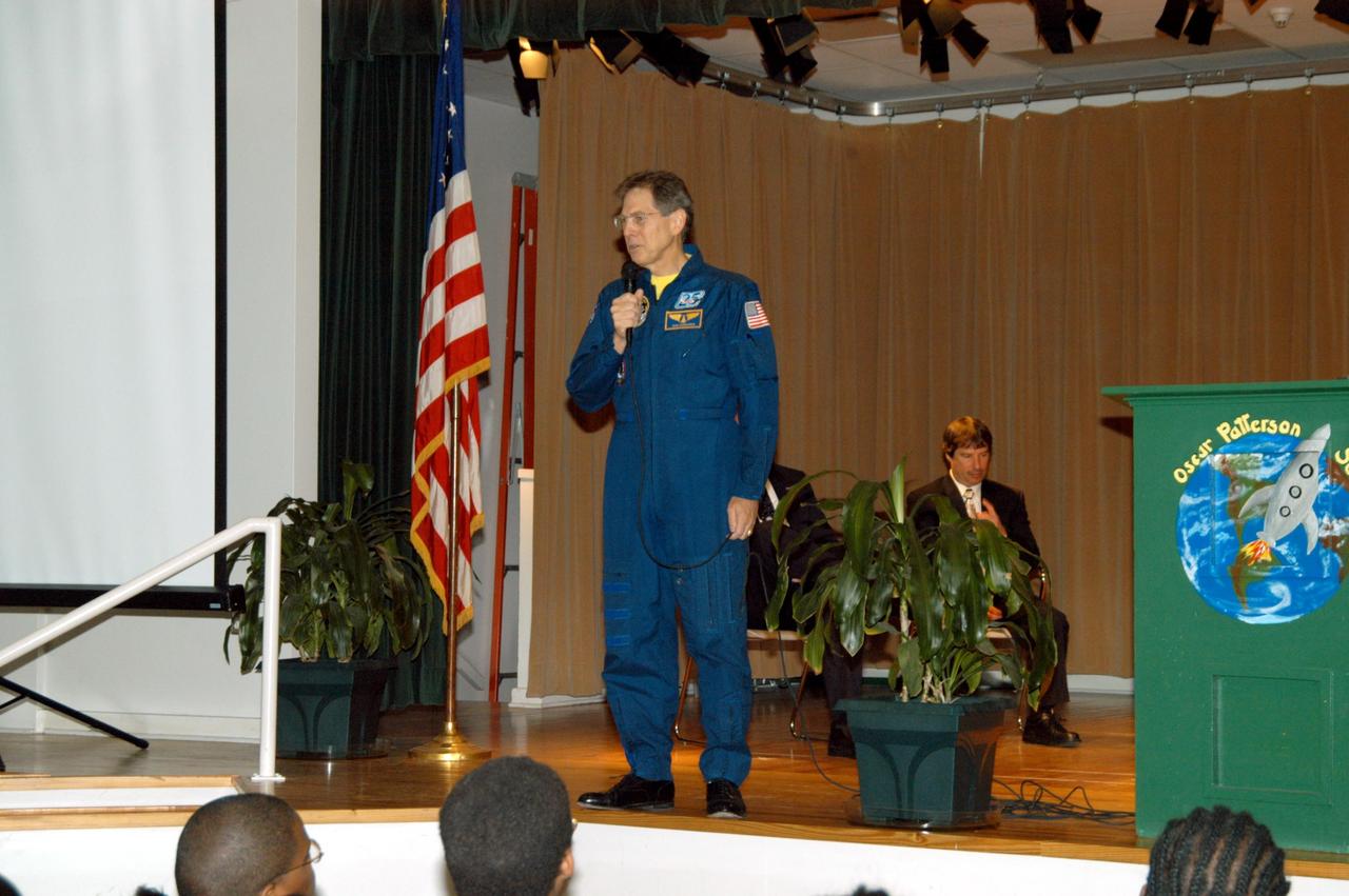 KENNEDY SPACE CENTER, FLA. -- Astronaut Sam Durrance shares stories of his experiences in space with the students at Oscar Patterson Elementary Magnet School in Panama City, Fla.  Durrance joined Center Director Jim Kennedy as he shares America’s new vision for space exploration with the next generation of explorers.  Kennedy is talking with students about our destiny as explorers, NASA’s stepping stone approach to exploring Earth, the Moon, Mars and beyond, how space impacts our lives, and how people and machines rely on each other in space.