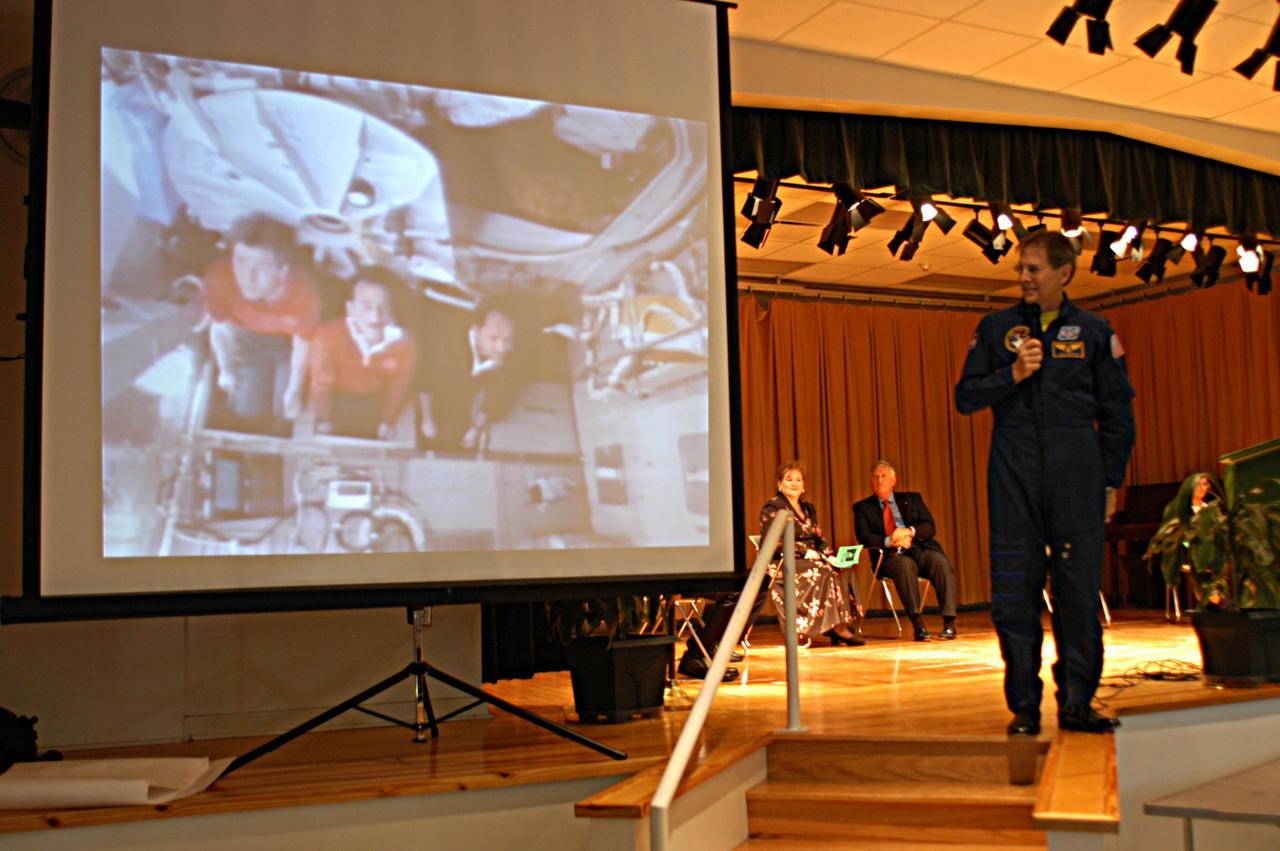 KENNEDY SPACE CENTER, FLA. -- As Sam Durrance shares stories of his experiences as an astronaut with the students at Oscar Patterson Elementary Magnet School in Panama City, Fla., he links to the Expedition 8 crew on the International Space Station.  Students were able to ask questions of the ISS crew. Durrance joined Center Director Jim Kennedy as he shares America’s new vision for space exploration with the next generation of explorers.  Kennedy is talking with students in NASA Explorer Schools in Florida and Georgia about our destiny as explorers, NASA’s stepping stone approach to exploring Earth, the Moon, Mars and beyond, how space impacts our lives, and how people and machines rely on each other in space.
