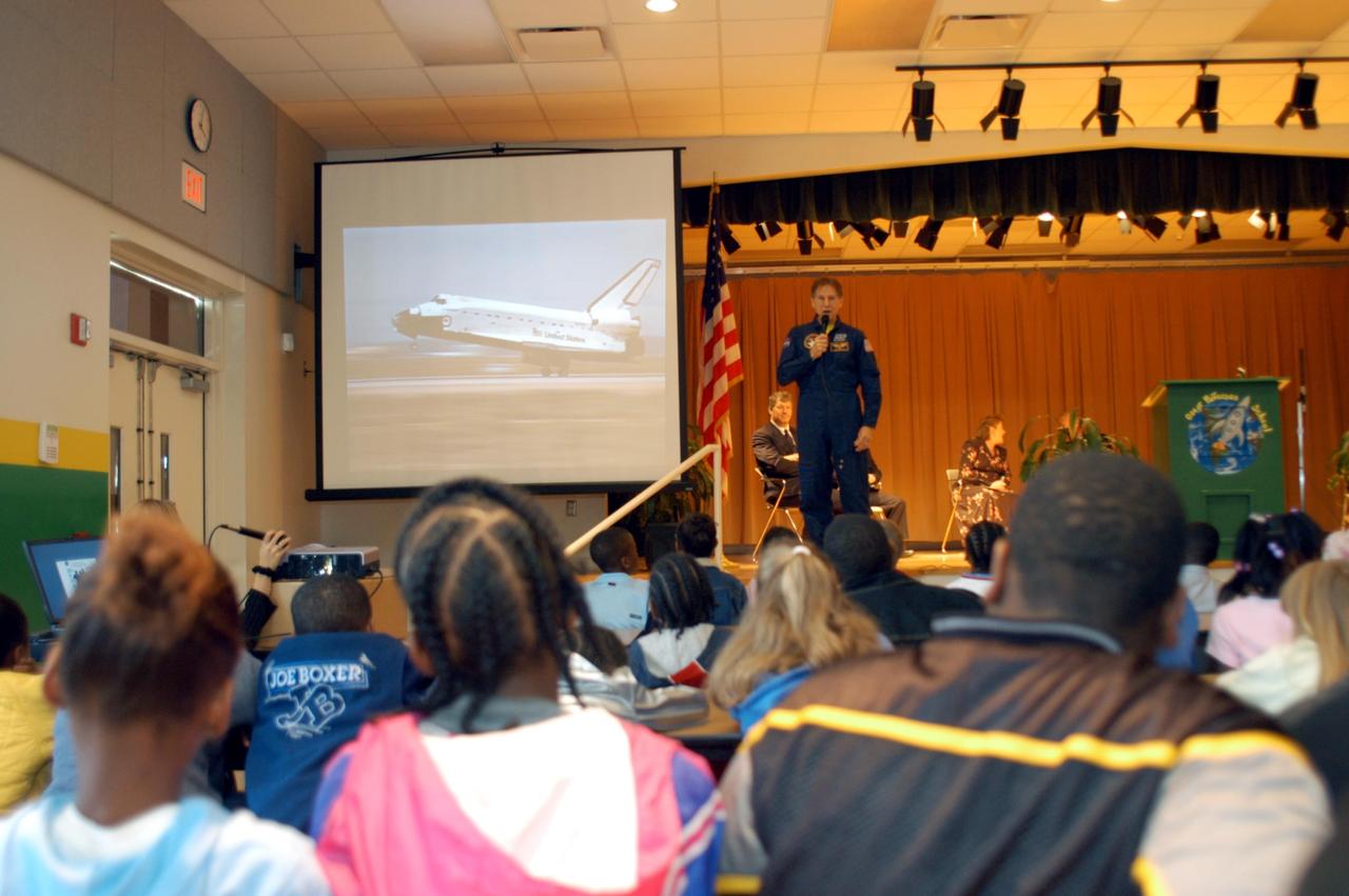 KENNEDY SPACE CENTER, FLA. -- Sam Durrance shares stories of his experiences as an astronaut with the students at Oscar Patterson Elementary Magnet School in Panama City, Fla.  Durrance joined Center Director Jim Kennedy as he shares America’s new vision for space exploration with the next generation of explorers.  Kennedy is talking with students in NASA Explorer Schools in Florida and Georgia about our destiny as explorers, NASA’s stepping stone approach to exploring Earth, the Moon, Mars and beyond, how space impacts our lives, and how people and machines rely on each other in space.