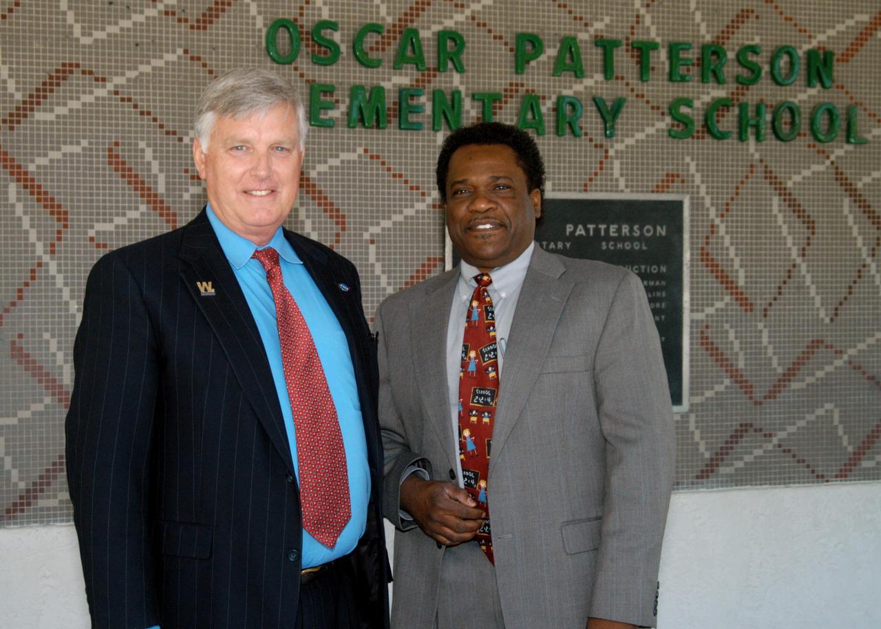 KENNEDY SPACE CENTER, FLA. -- Center Director Jim Kennedy stands with Dr. Linward Barnes, principal of Oscar Patterson Elementary Magnet School in Panama City, Fla.  Kennedy is touring Florida and Georgia NASA Explorer Schools to share America’s new vision for space exploration with the next generation of explorers.  Kennedy is talking with students about our destiny as explorers, NASA’s stepping stone approach to exploring Earth, the Moon, Mars and beyond, how space impacts our lives, and how people and machines rely on each other in space.