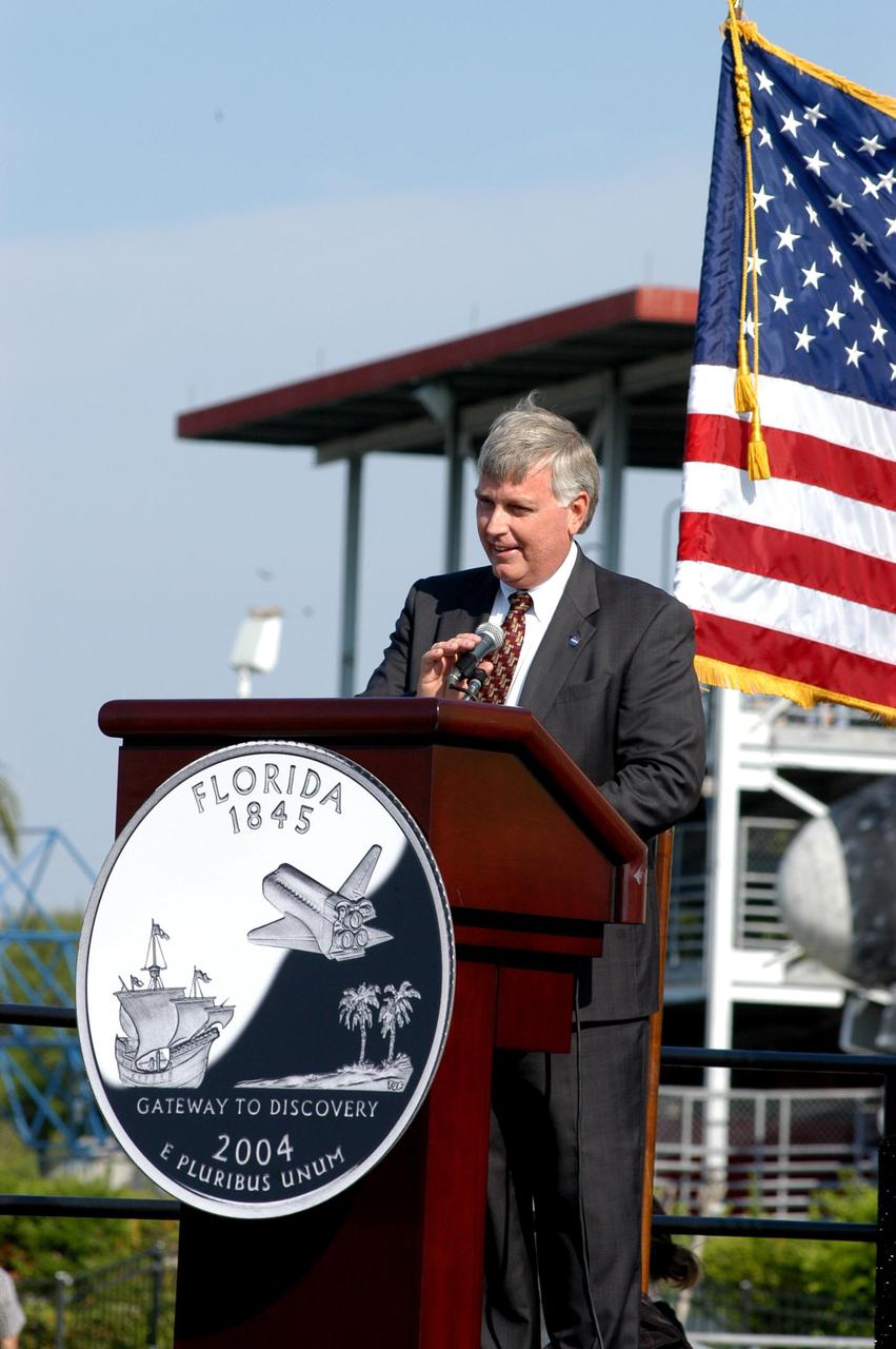 KENNEDY SPACE CENTER, FLA. -- As master of ceremonies, Center Director Jim Kennedy opens the event at the KSC Visitor Complex launching the new Florida quarter.  Participating were NASA Administrator Sean O’Keefe, Deputy Secretary of the Treasury Samuel W. Bodman, U.S. Mint Director Henrietta Holsman Fore and Florida Gov. Jeb Bush.  The quarter celebrates Florida as a destination for explorers in the past, a launch site for future explorers into space and an inviting place for visitors today.