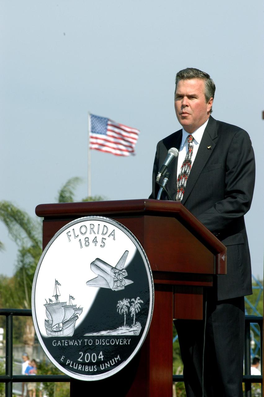 KENNEDY SPACE CENTER, FLA. -- Florida Gov. Jeb Bush addresses the audience at a ceremony to launch the new Florida quarter, held at the KSC Visitor Complex. The quarter celebrates Florida as the gateway to discovery -- a destination for explorers in the past, a launch site for space explorers of the future, and an inviting place for visitors today.
