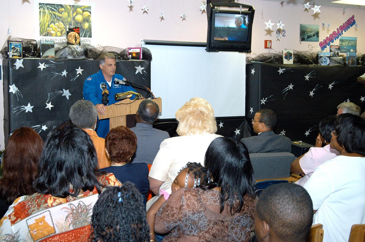 KENNEDY SPACE CENTER, FLA. - Astronaut Dr. David A. Wolf speaks to students, faculty and guests at Carol City Elementary School, a NASA Explorer School, in Miami, Fla. Wolf and Center Director Jim Kennedy made the tour to share America’s new vision for space exploration with the next generation of explorers. Kennedy is talking with students about our destiny as explorers, NASA’s stepping stone approach to exploring Earth, the Moon, Mars and beyond, how space impacts our lives, and how people and machines rely on each other in space.