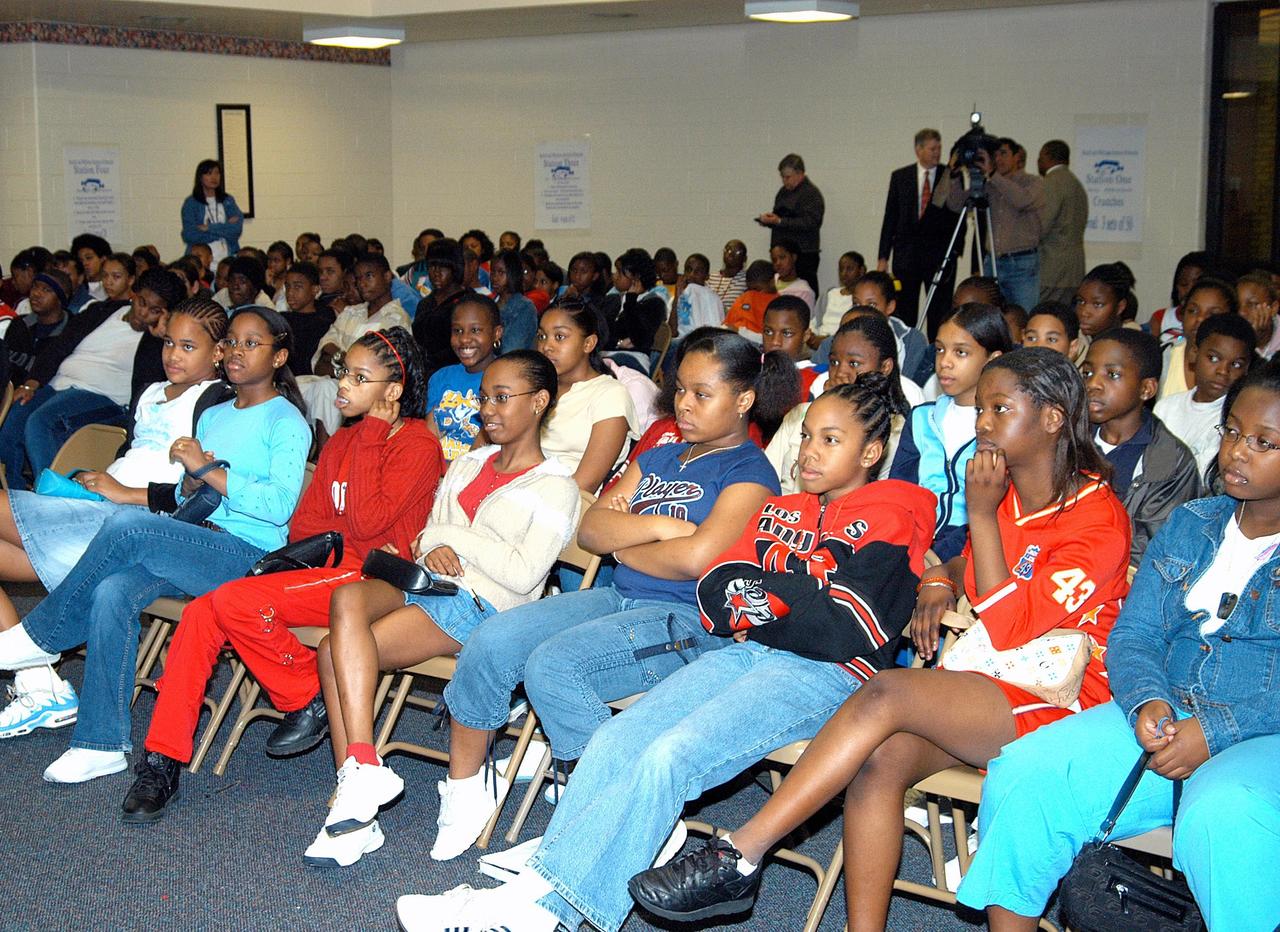 KENNEDY SPACE CENTER, FLA. -  Students at Ralph Bunche Middle School, a NASA Explorer School, in Atlanta, Ga., listen intently to Center Director Jim Kennedy’s presentation.  Kennedy is visiting NES sites to share America’s new vision for space exploration with the next generation of explorers. He was accompanied by astronaut Rick Linnehan on the visit.  The purpose of the school visit is to talk with students about our destiny as explorers, NASA’s stepping stone approach to exploring Earth, the Moon, Mars and beyond, how space impacts our lives, and how people and machines rely on each other in space.